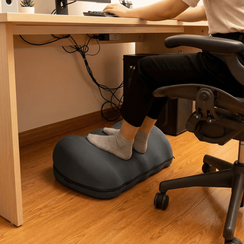 Everlasting Comfort Adjustable Cloud Foot Rest in use under a desk